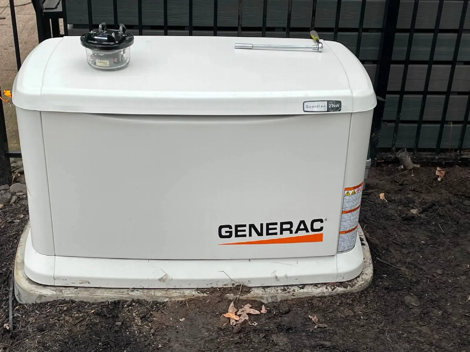 Front view of a Generac Guardian generator during installation